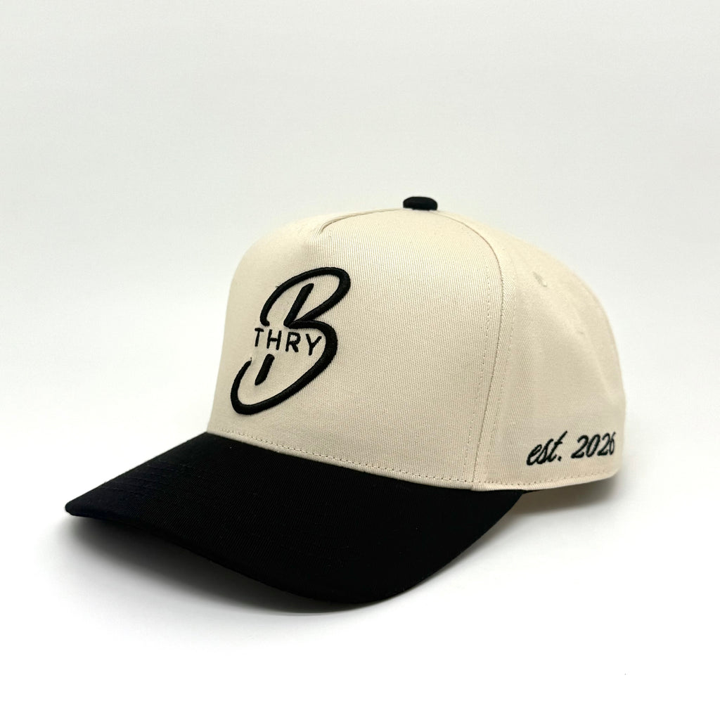 Black and white THRY Oreo hat with embroidered logo