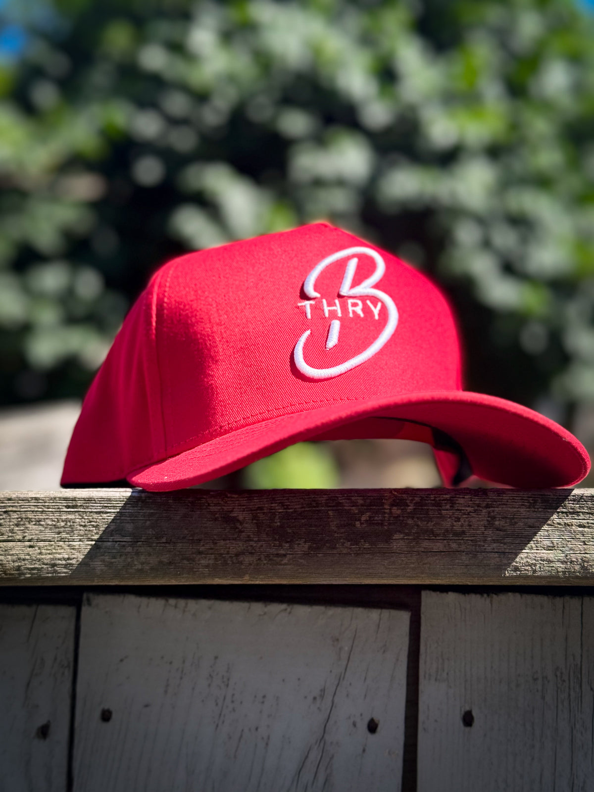 Red THRY hat lifestyle image
